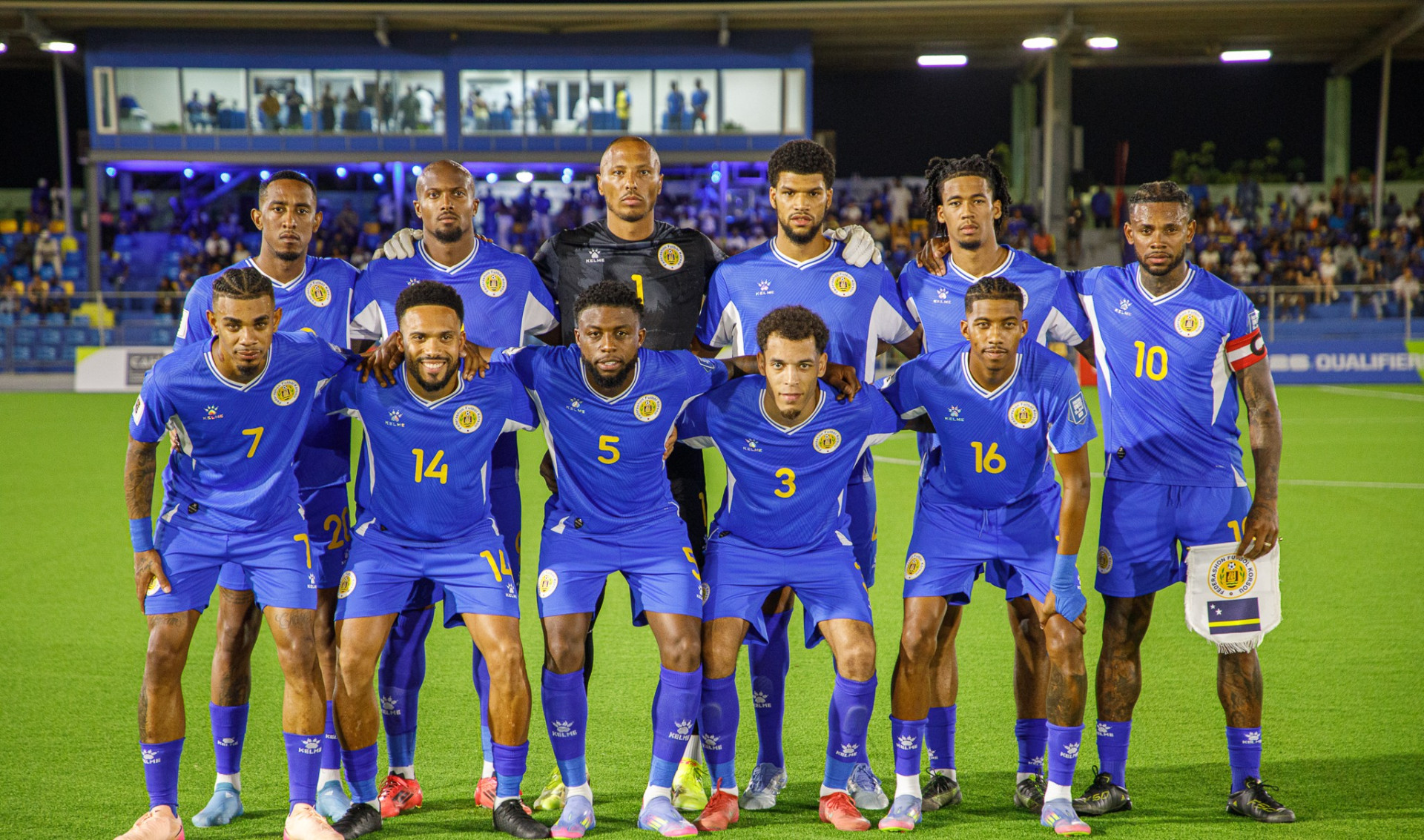 Curaçao football players gathered on the pitch